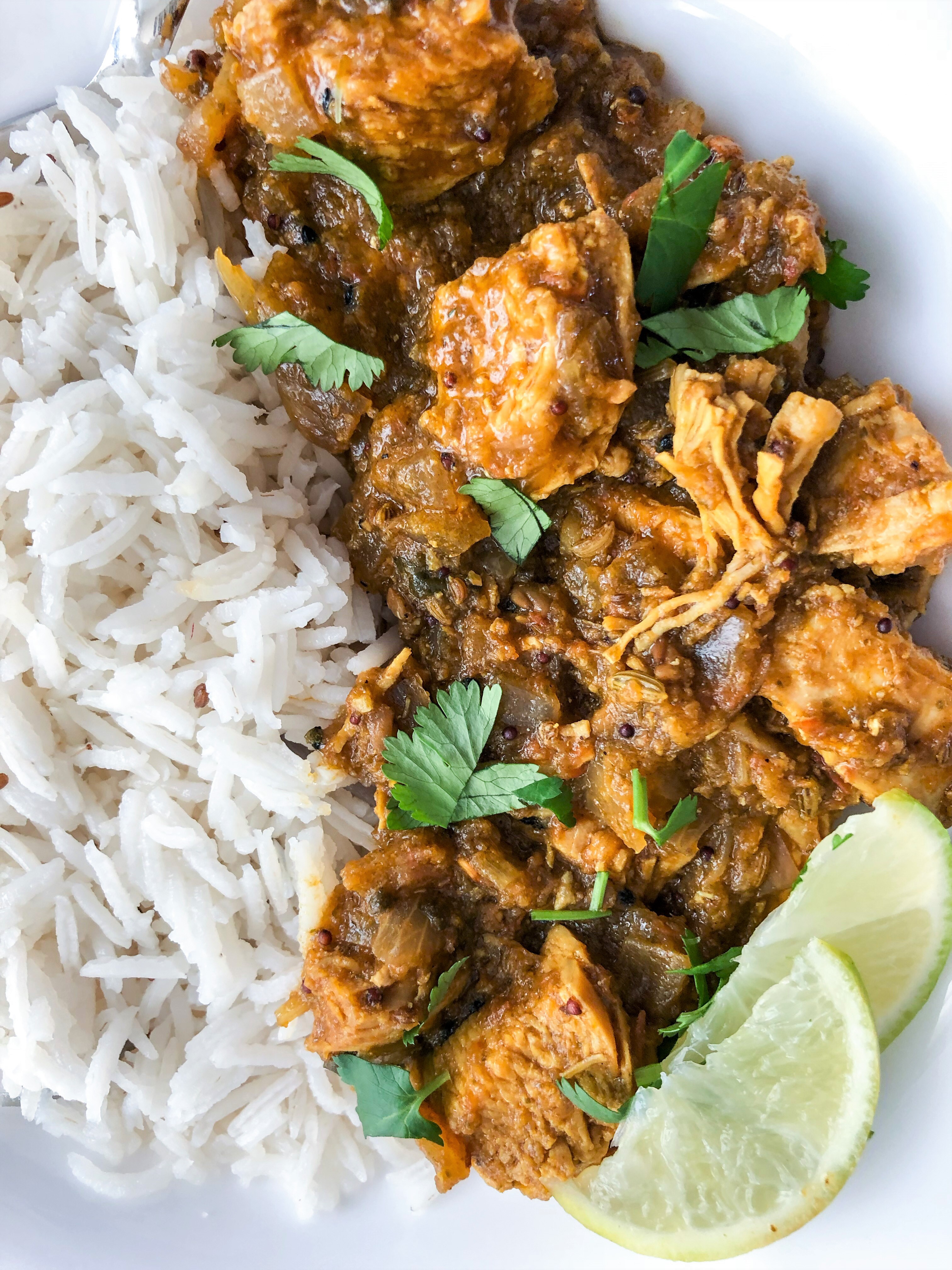 Easy coriander chicken with rice cilantro lime wedges