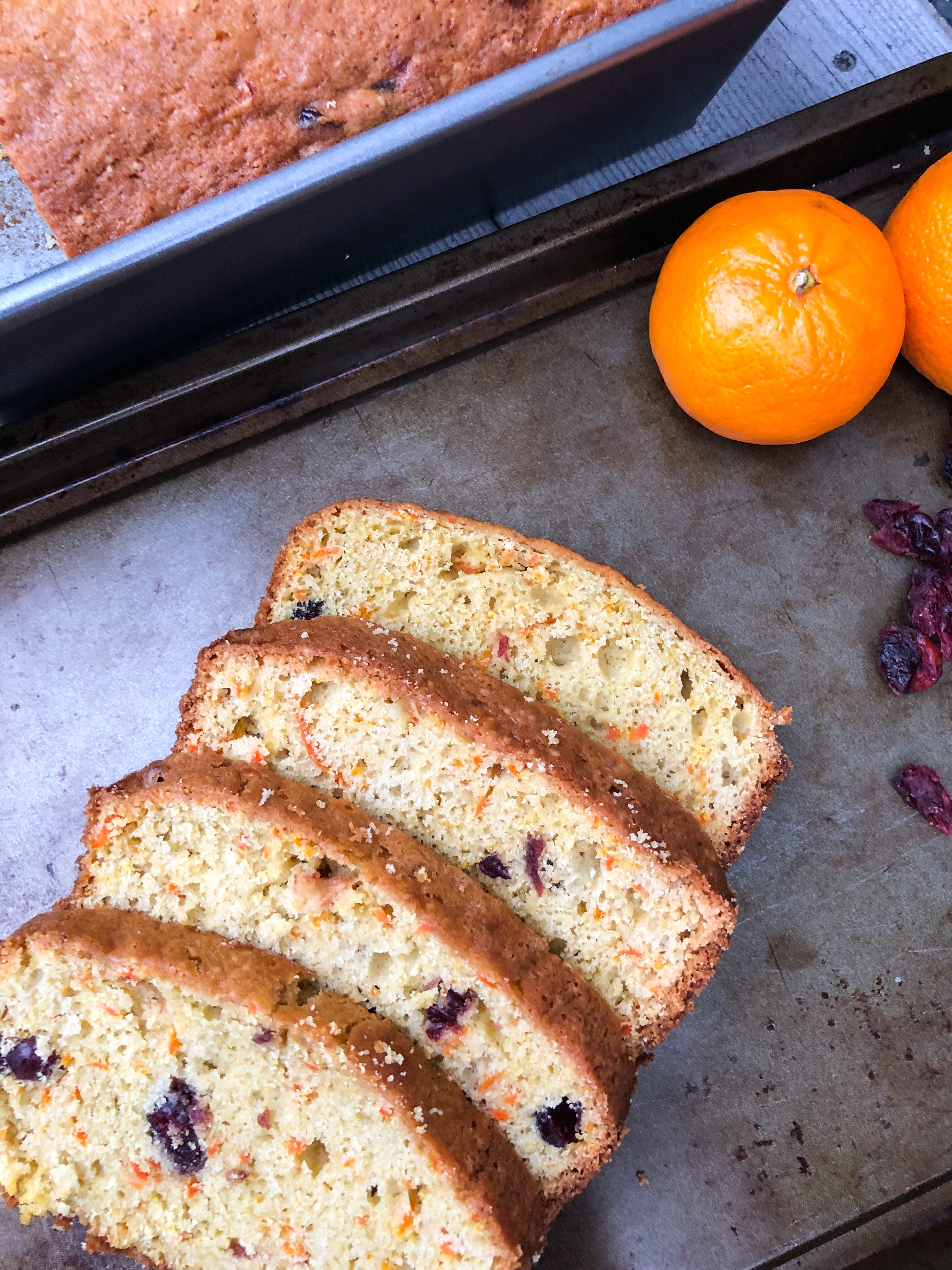 Slices of Citrus Scented Carrot Cranberry Loaf Cake