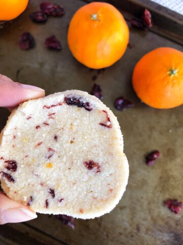 Easy shortbread style citrus scented egg less cranberry cookies