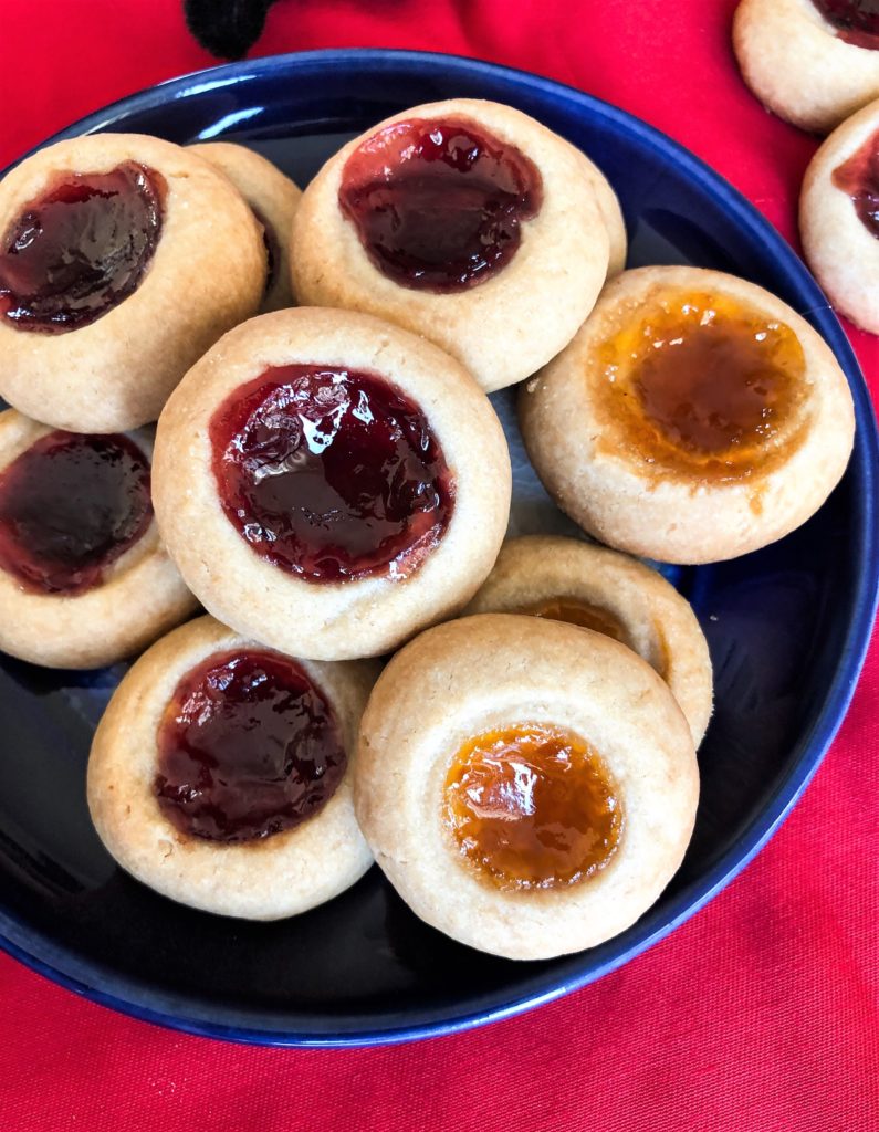 Classic Jam-filled thumbpring cookies made healthier with whole wheat flour