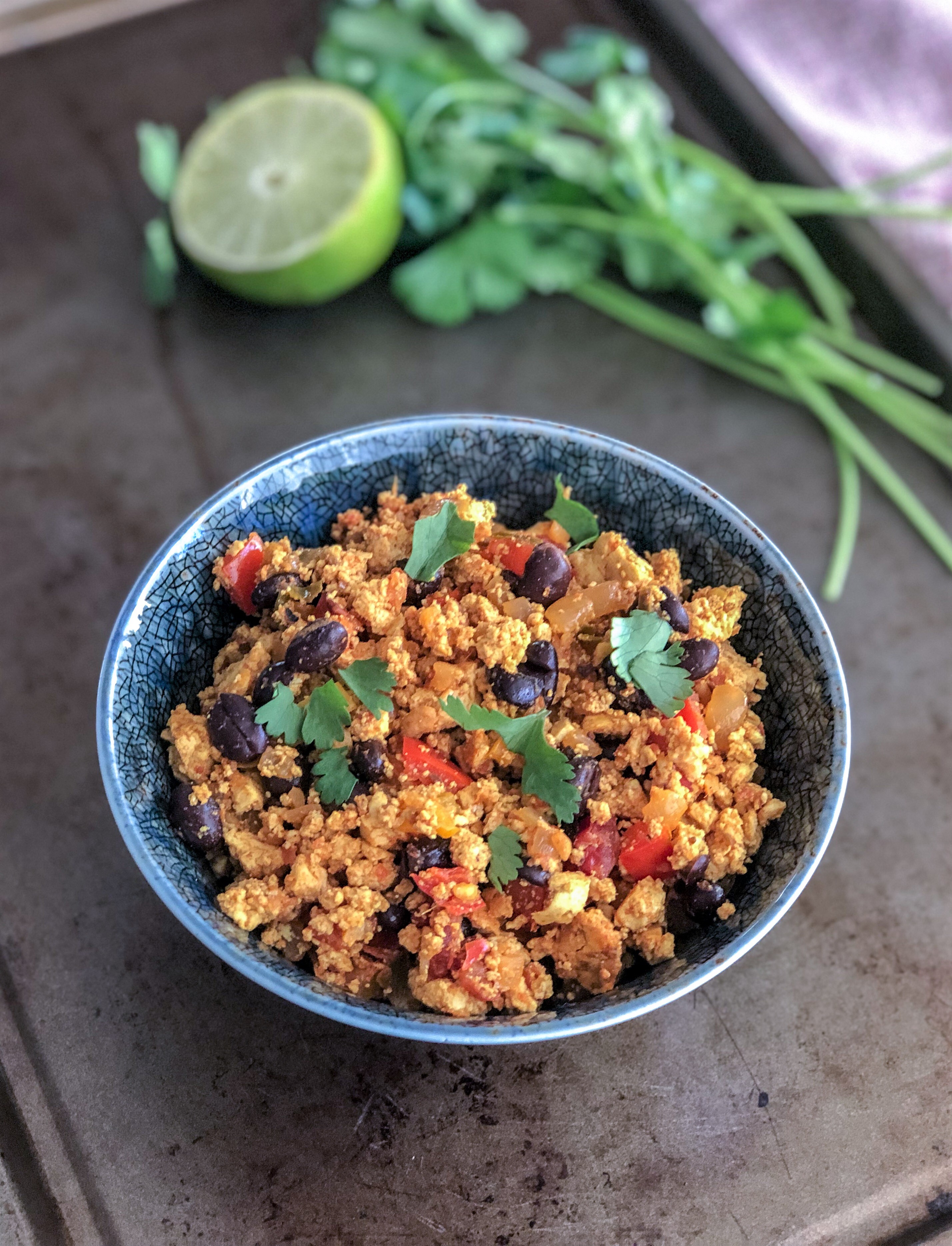 Vegan Southwestern Tofu scramble with bell peppers, salsa and black beans