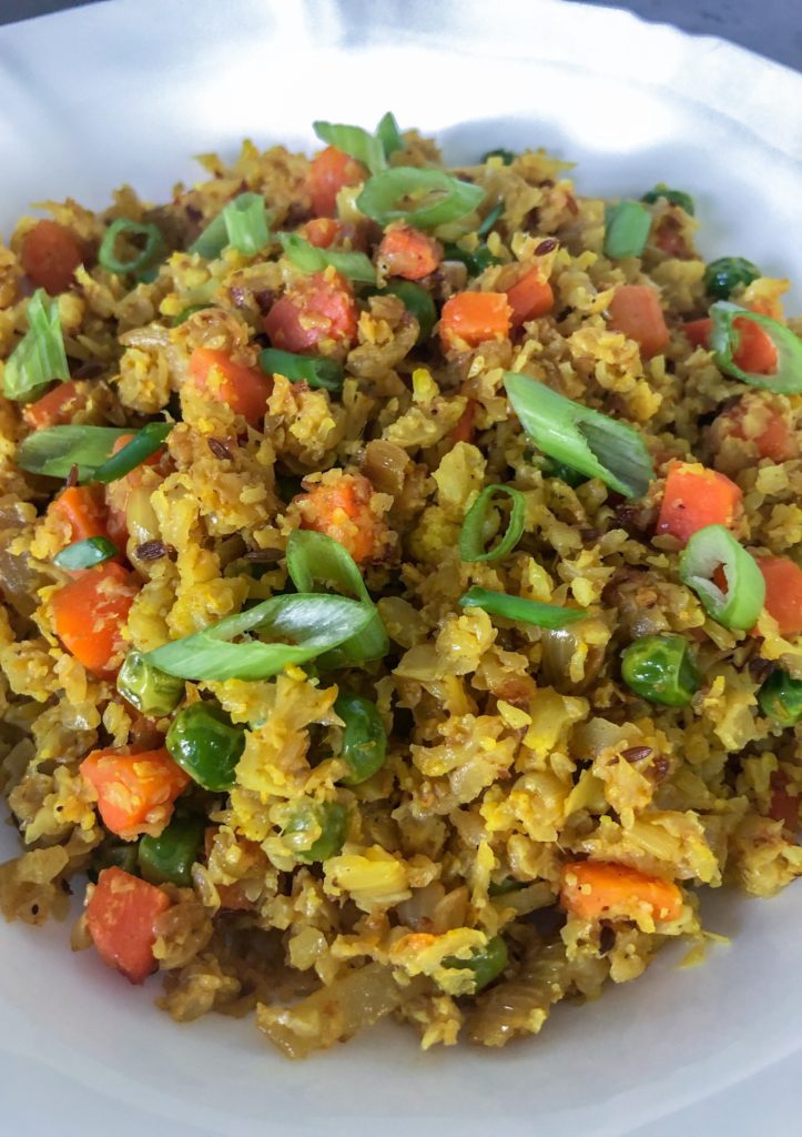 Turmeric keto cauliflower rice recipe that comes together in one pot in less than 15 minutes. A great low carb alternatice to rice.