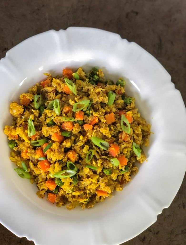 Turmeric keto cauliflower rice recipe that comes together in one pot in less than 15 minutes. A great low carb alternatice to rice.