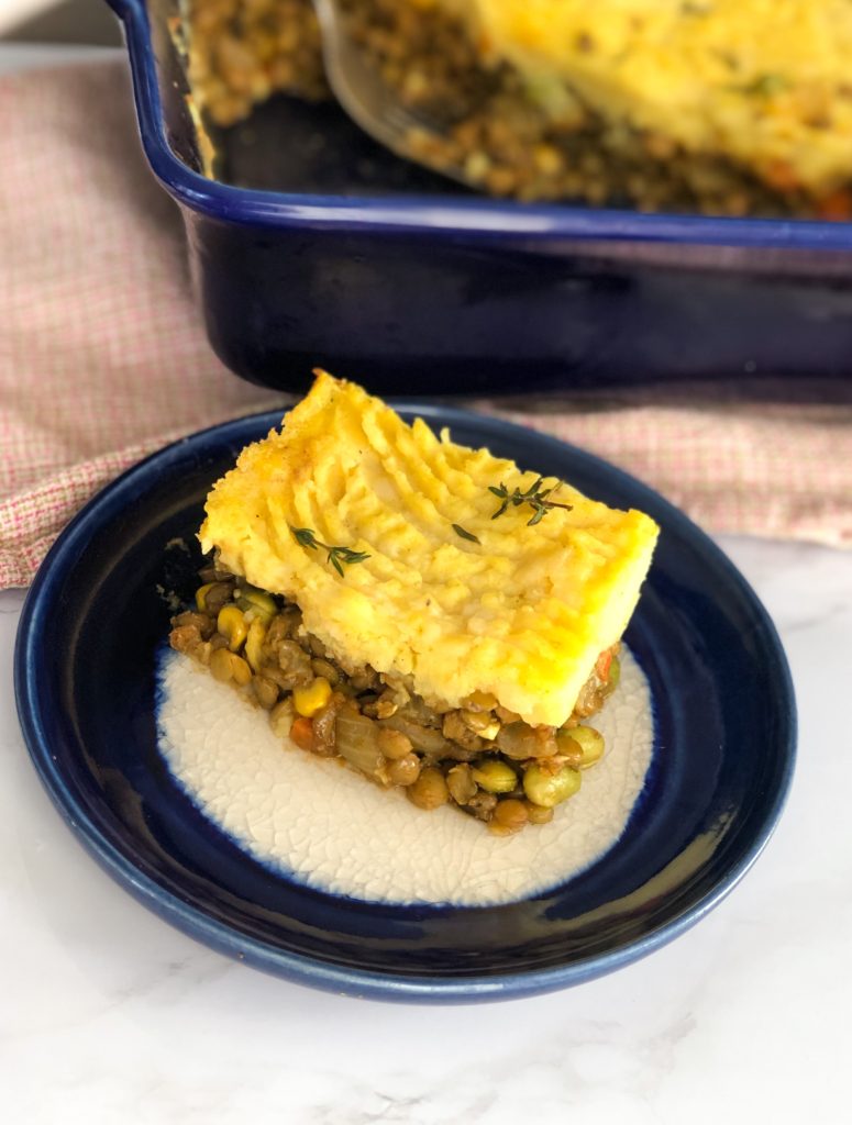 A slice of Vegetarian Shepherds Pie with Lentils and Indian Flavors