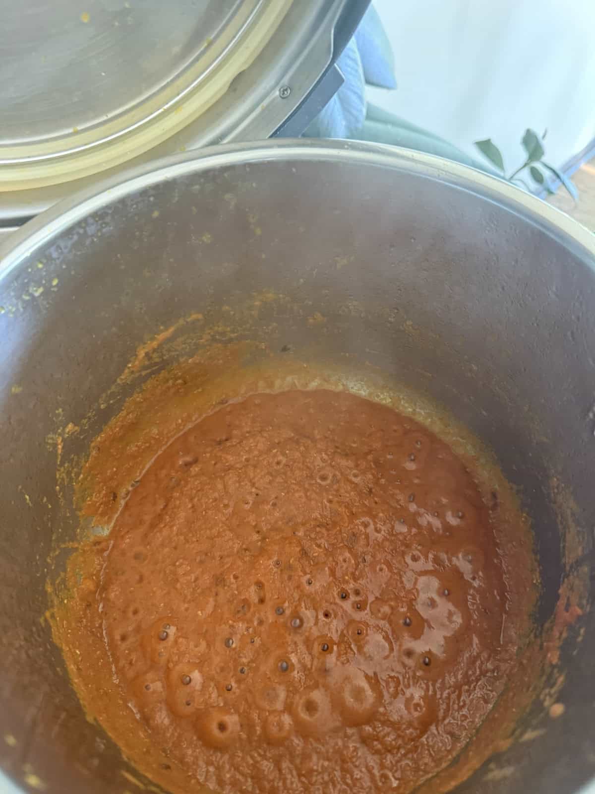 cooke onion tomato masala in the stainless steel insert of the Instant Pot.